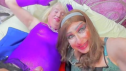 Blonde and brunette playing with their beautiful bodies